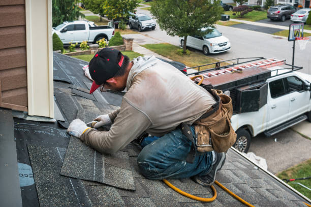 Professional Roofing technician working in Burbank, WA